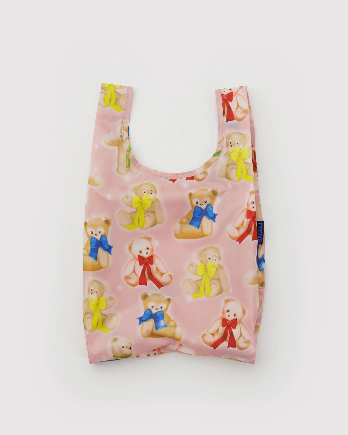 Reusable shopping bag with teddy bear pattern on a white background