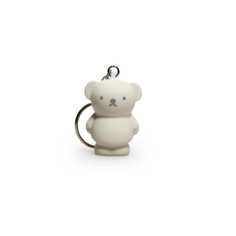 White/Beige bear-shaped keychain on a white background