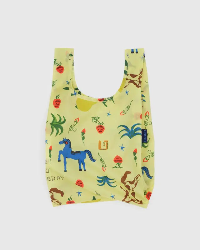 Reusable shopping bag with colorful animal and plant pattern on a light yellow background