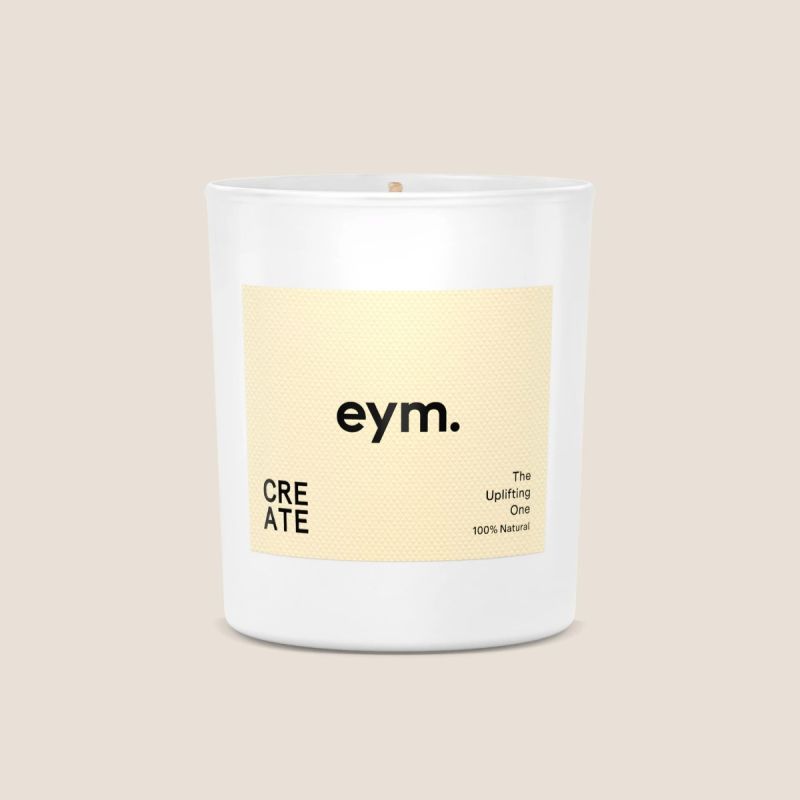 Eym Create Scented Candle in a glass jar
