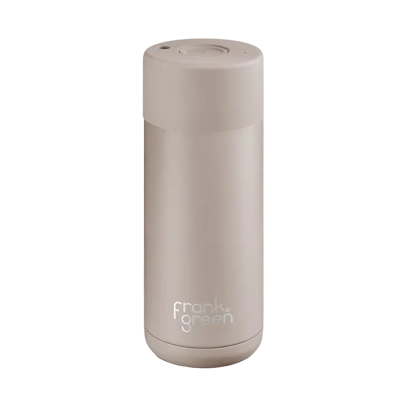 Beige reusable coffee cup with 'frank green' branding on a white background