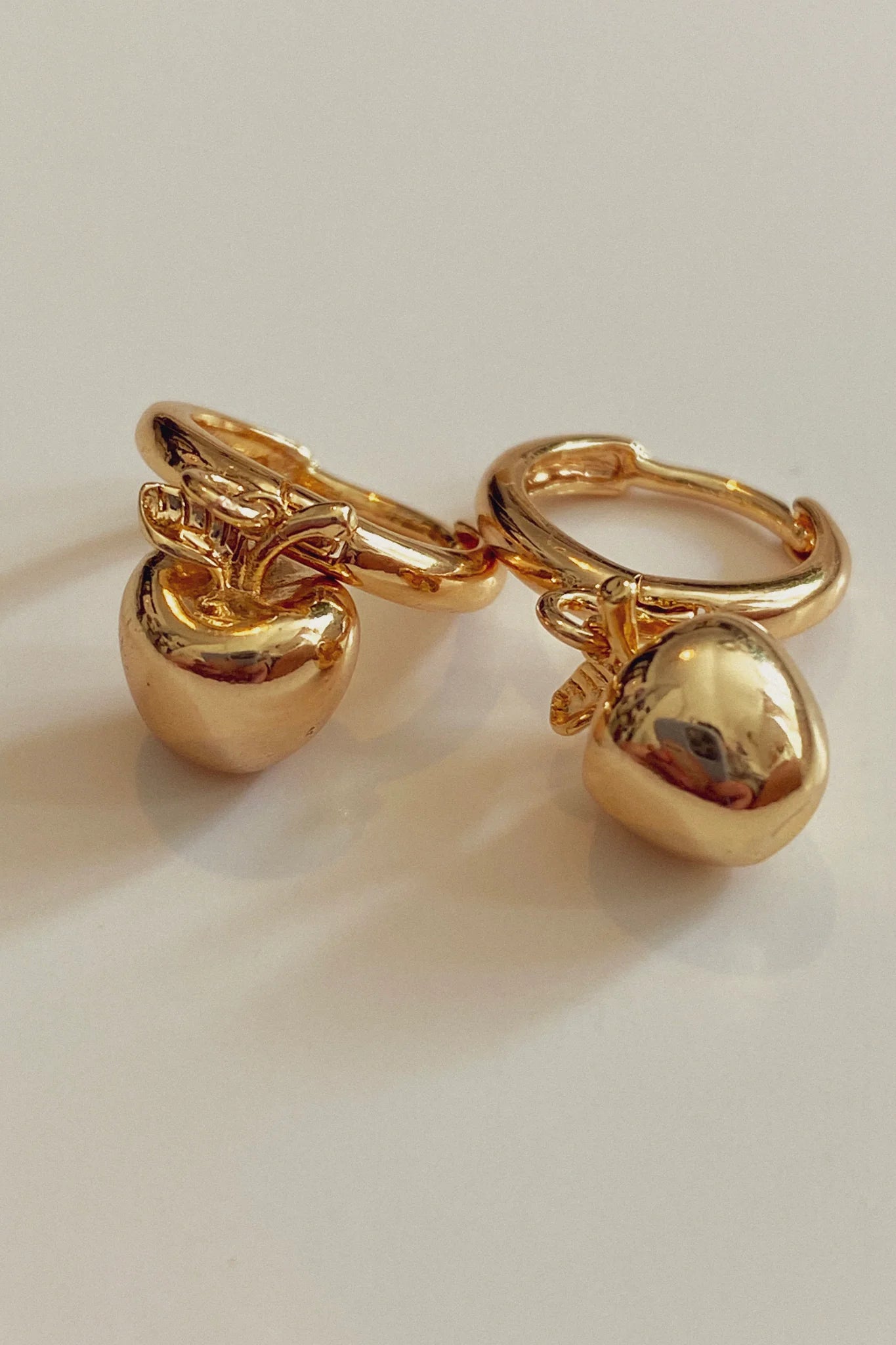 bloma gold apple hoop earrings