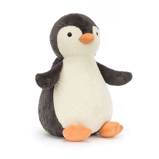 Plush toy penguin on a white background