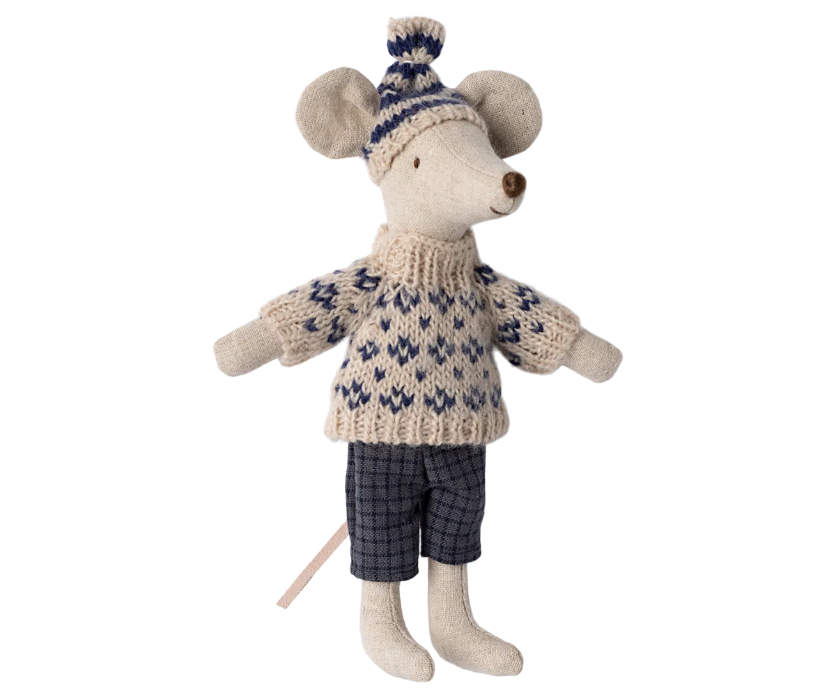 Stuffed toy mouse wearing a knitted sweater and hat on a white background
