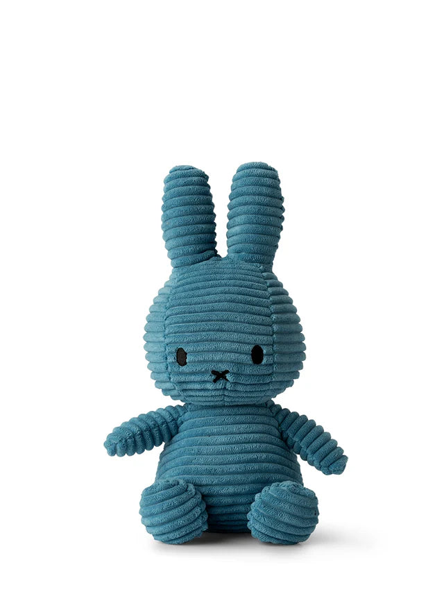 Blue plush bunny toy on a white background