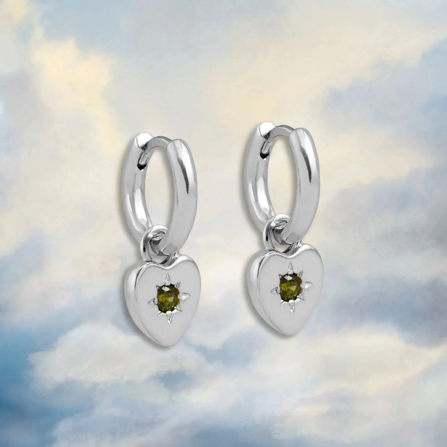 junk jewels periodt heart charm earrings in silver