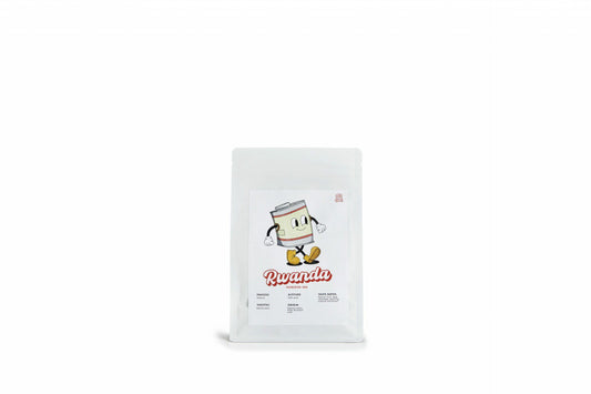 Ride & Grind Rwanda Coffee Beans in a white plastic bag.