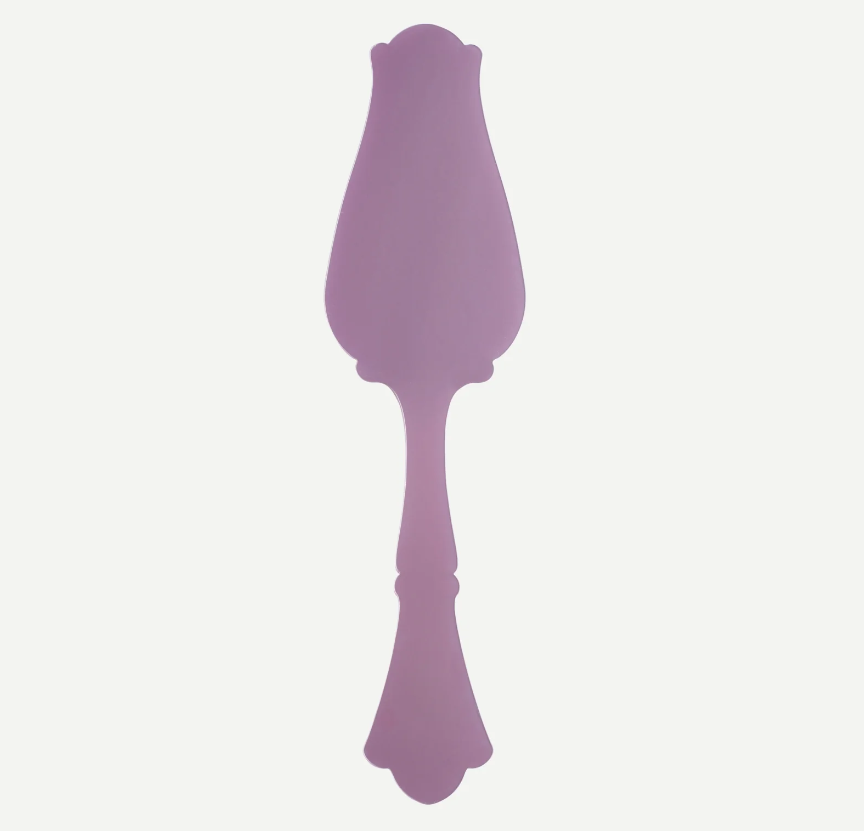 A single lavender purple decorative spoon-shaped wall mirror with a scalloped handle, shown against a plain off-white background.