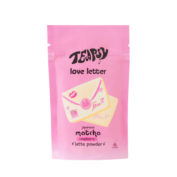 Pink package of Teapigs Japanese Matcha Raspberry Latte Powder on a white background