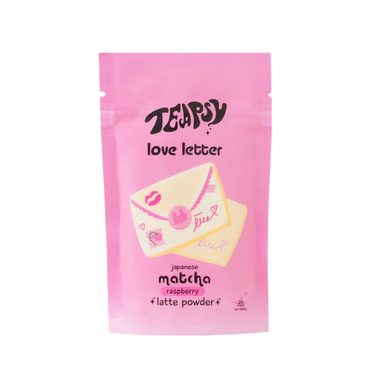 Pink package of Teapigs Japanese Matcha Raspberry Latte Powder on a white background