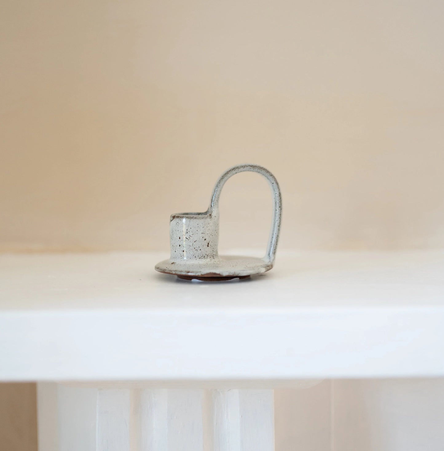 Morgan Wright Wee Willy Winkee Candle Holder in Tawny Blue colour on a beige background