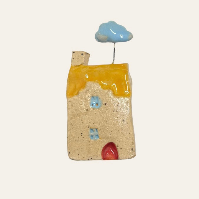 tiny little ceramic scottish house
