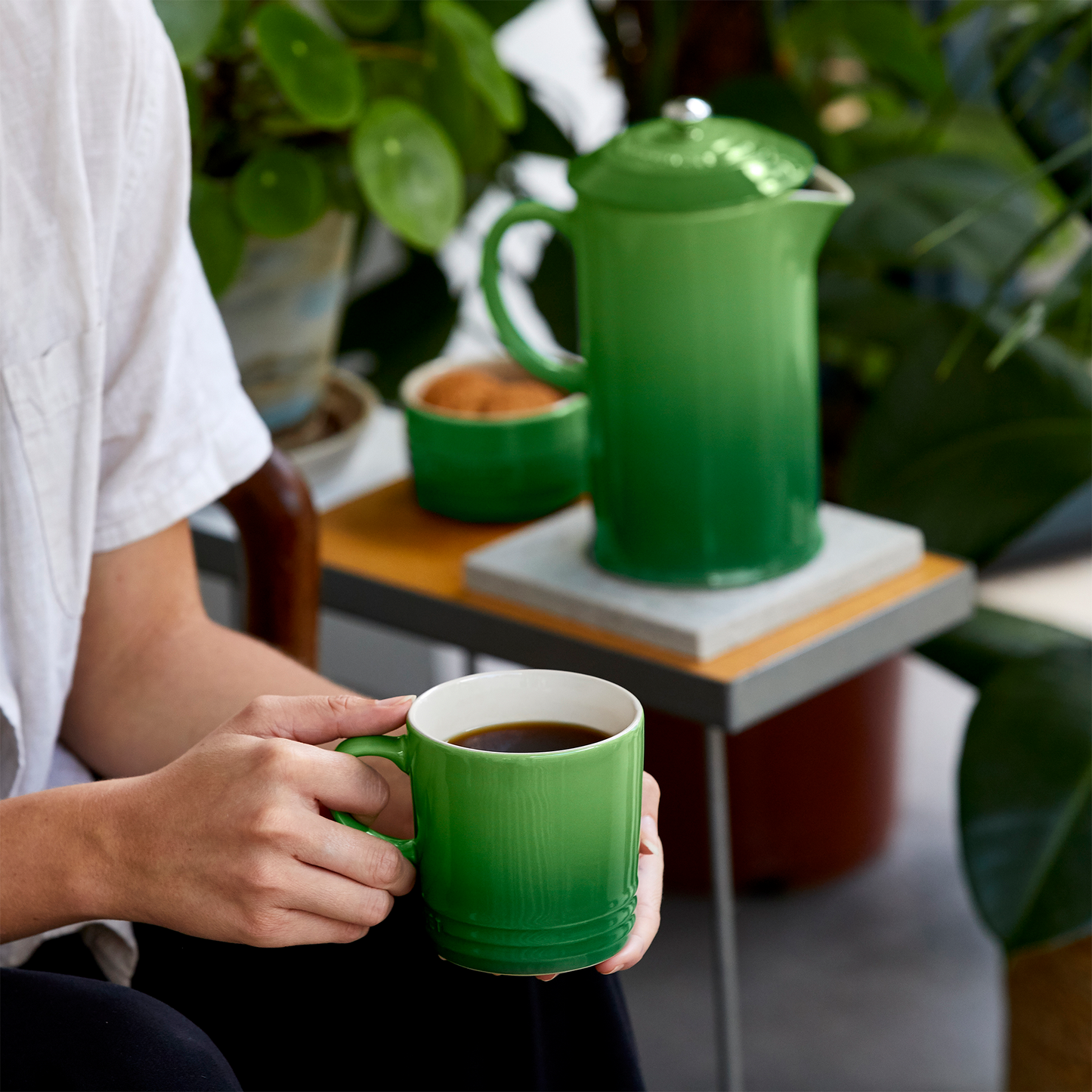 a man drinking coffee from the mug with the matching cafetiere