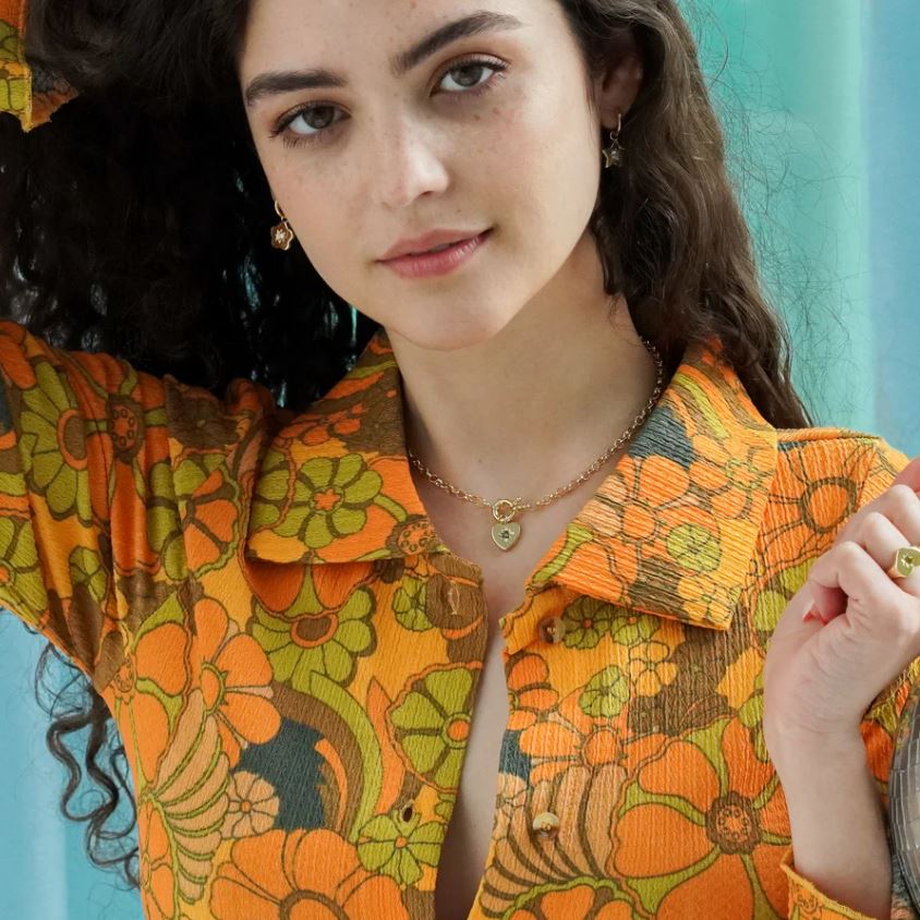 model wears the necklace
