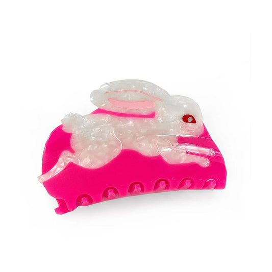 Pink hair claw with white bunny on a white background 