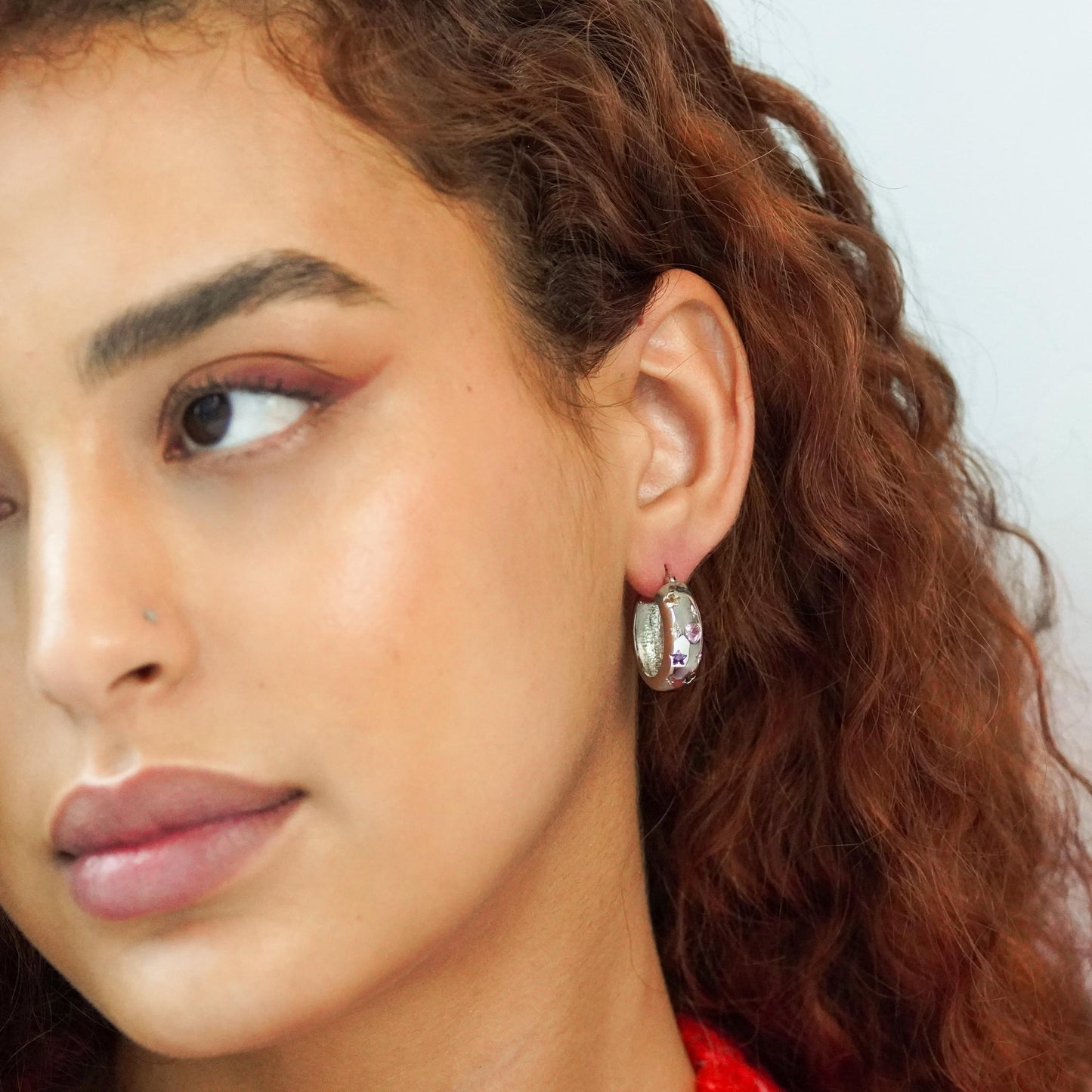 model wearing the earrings