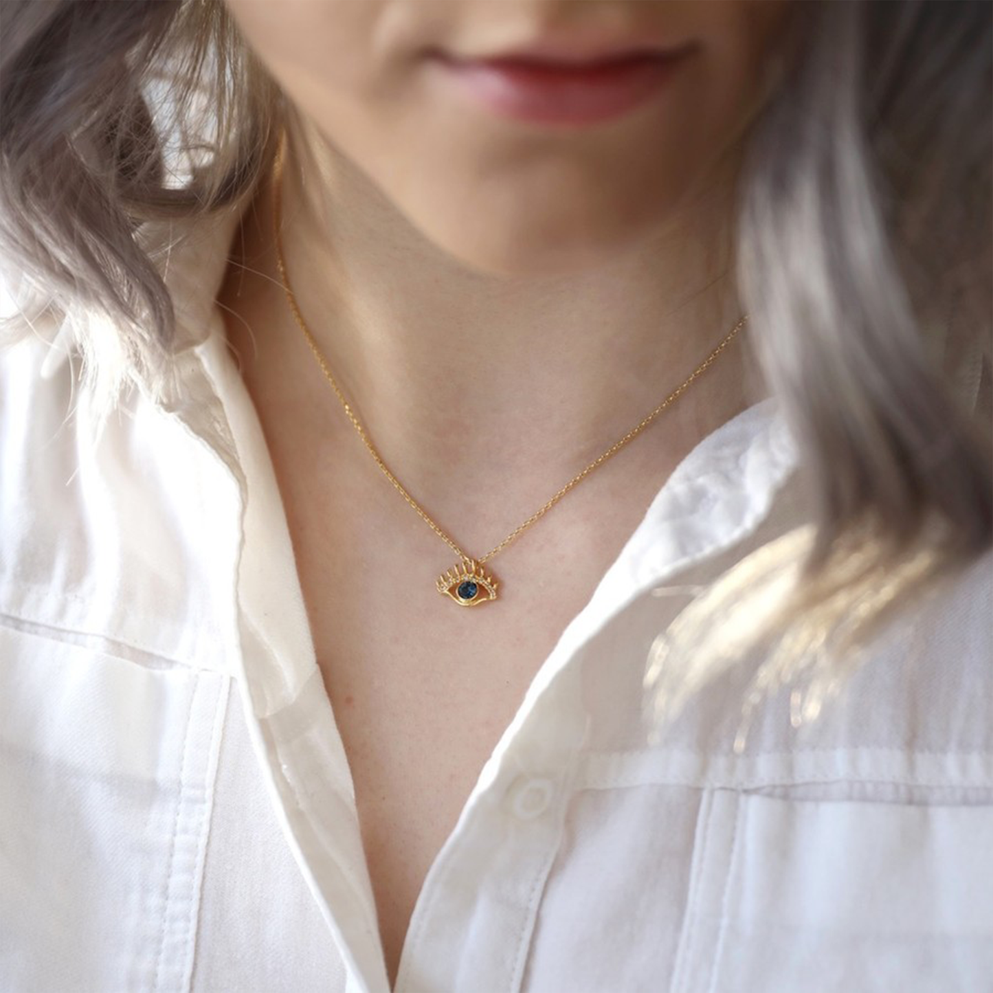 Gold and Blue Crystal Eye Pendant Necklace