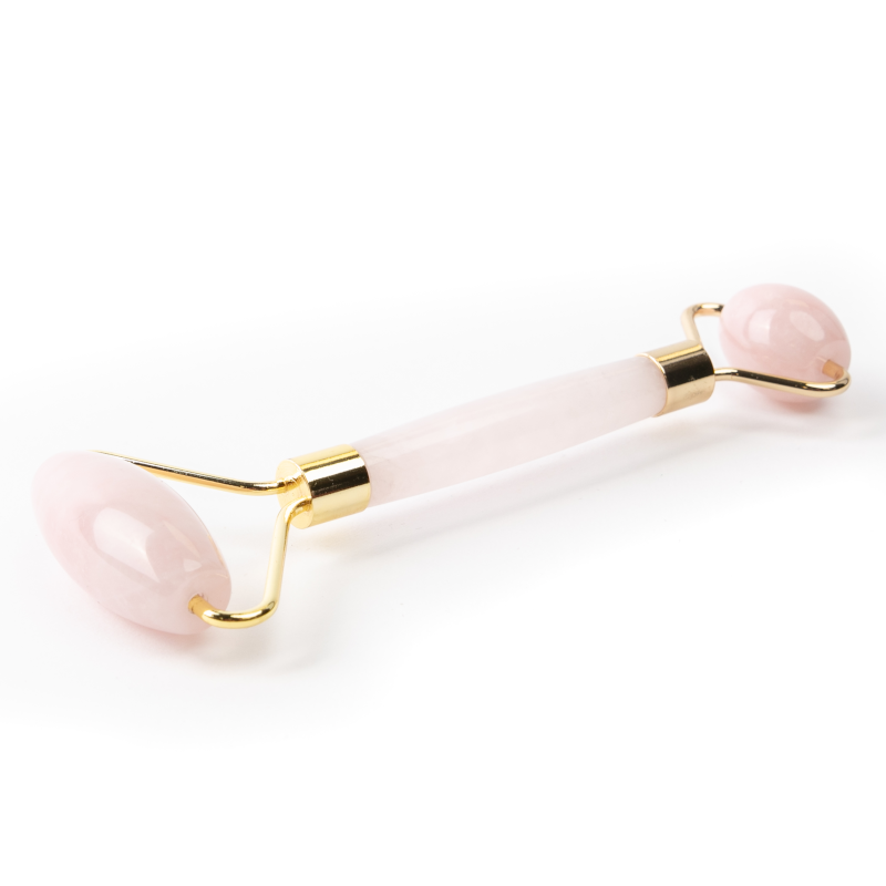 the double ended facial roller with gold and quartz hardware