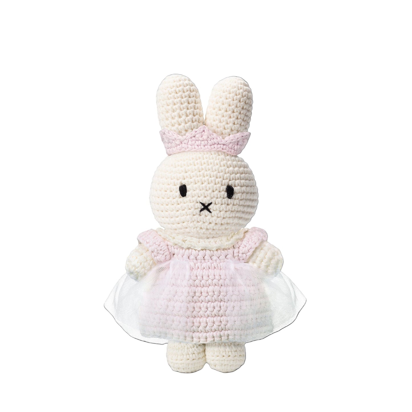 Crocheted bunny toy in a pink dress on a white background