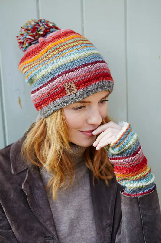 multicolour knitted beanie with a pom pom