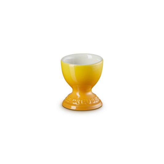 le creuset stoneware egg cup in deep yellow 