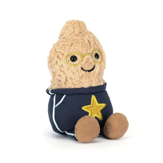 Plush toy resembling a peanut in a navy outfit with a yellow star on a white background
