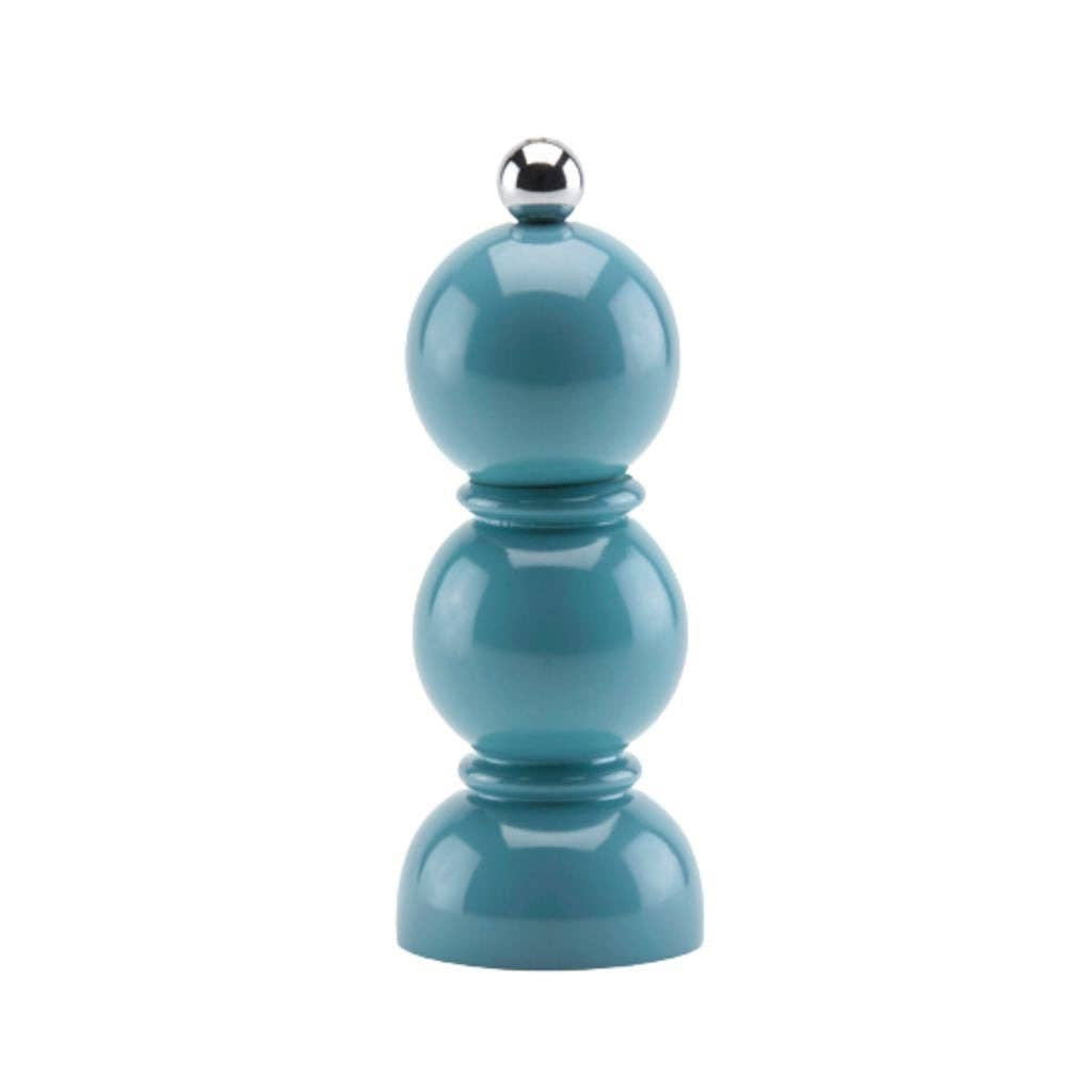 Teal pepper grinder with silver top on a white background