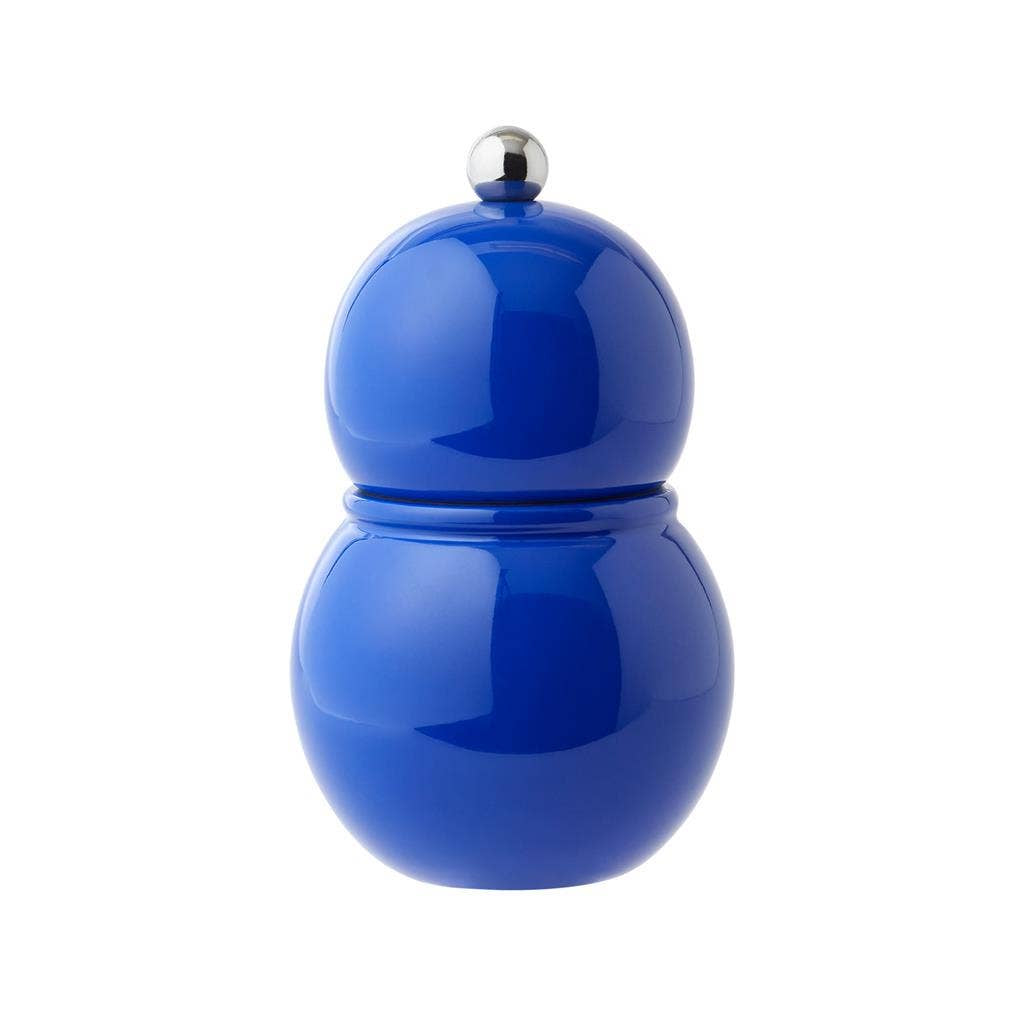 Blue wooden pepper grinder with a silver top on a white background