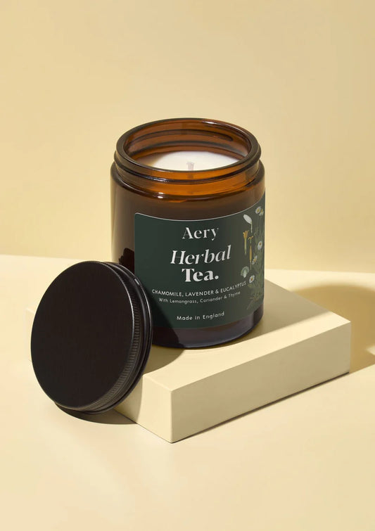 Aery Herbal Tea Scented Candle in a glass jar