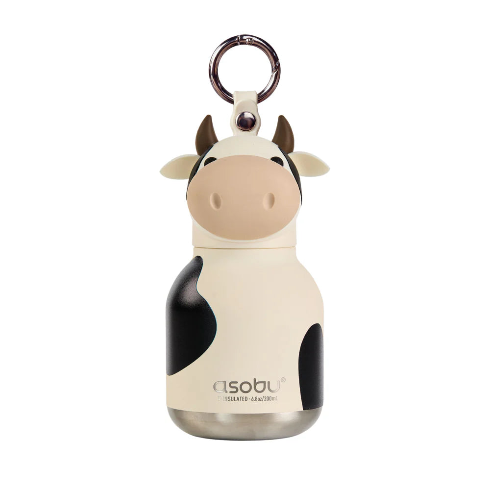 Cow-themed water bottle with keychain on a white background