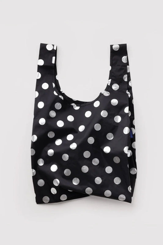 A reusable black nylon shopping bag with a shiny silver polka dot pattern, shown against a plain light gray background.