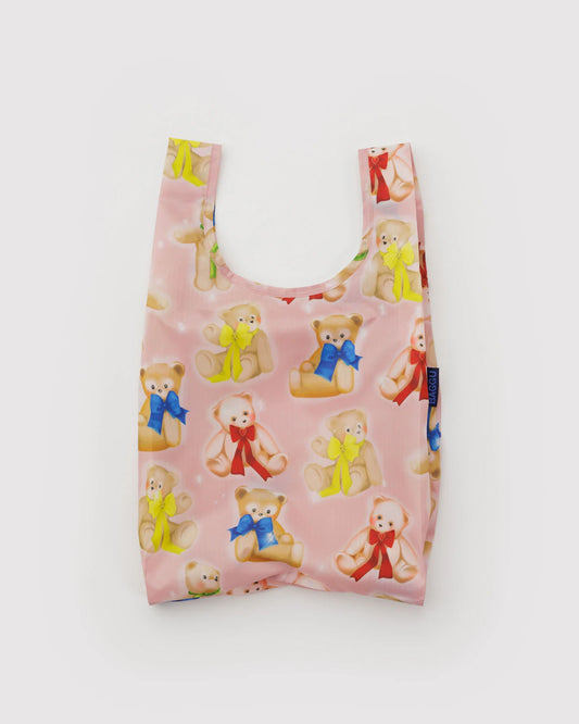Reusable shopping bag with teddy bear pattern on a white background
