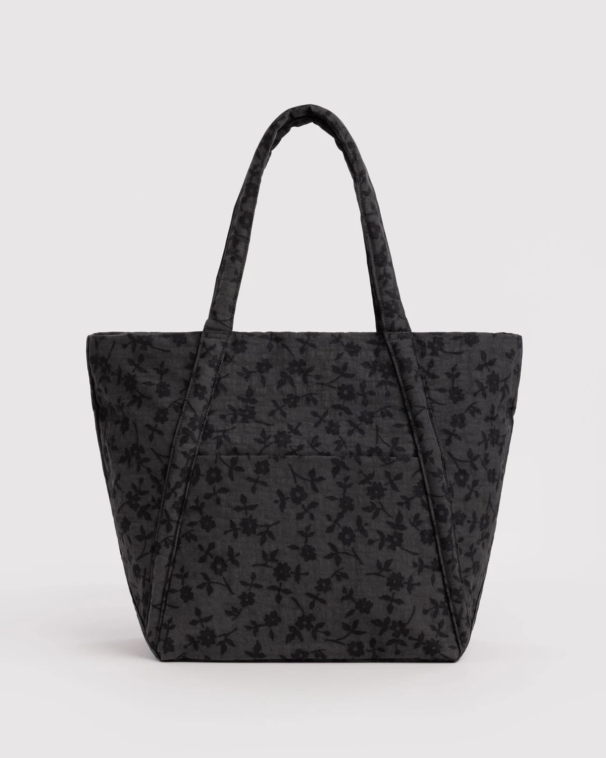 Black floral-patterned tote bag on a light gray background