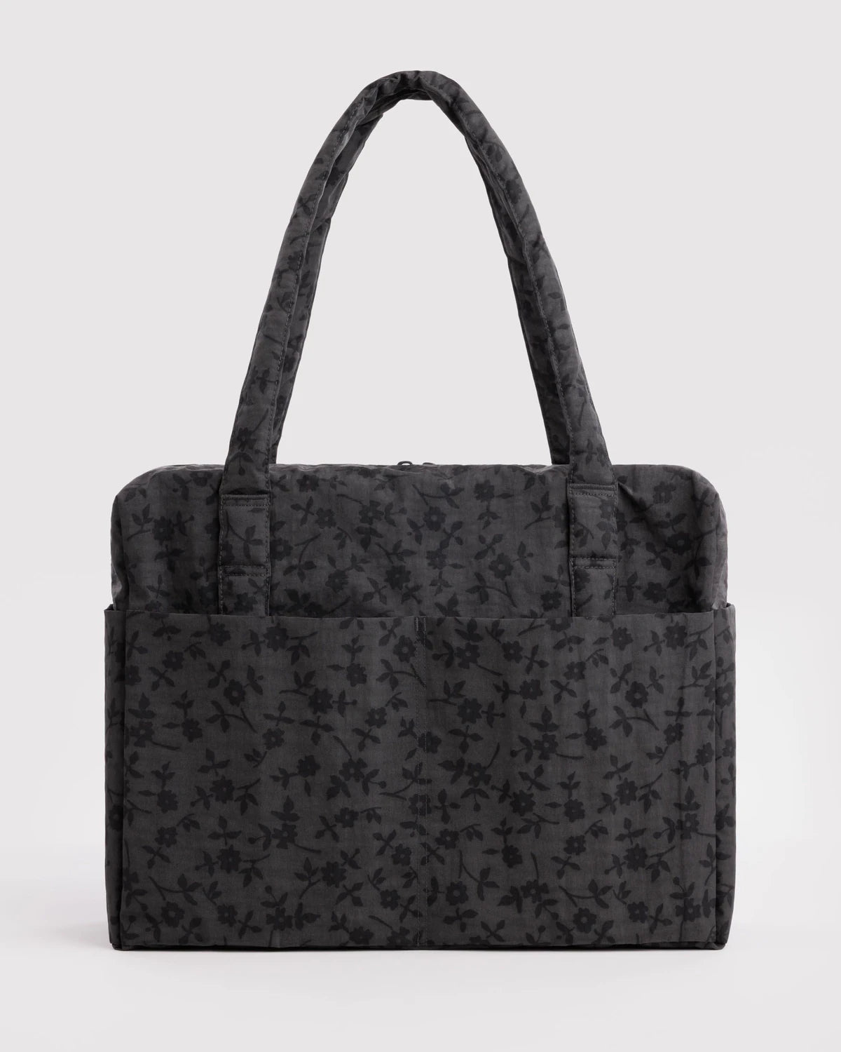 Black floral patterned tote bag on a white background