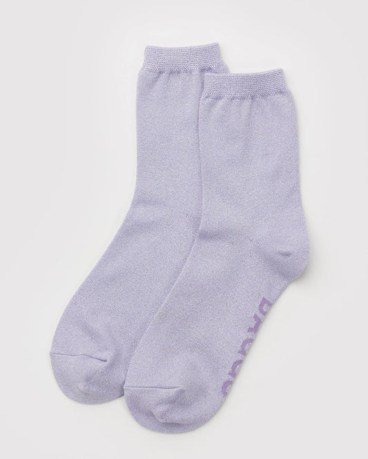 Pair of light purple socks on a white background