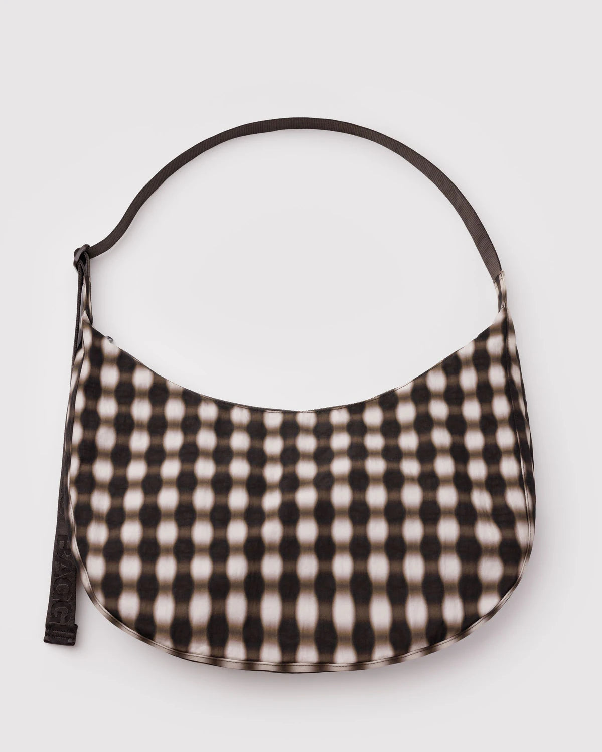 Black and white checkered handbag on a light gray background