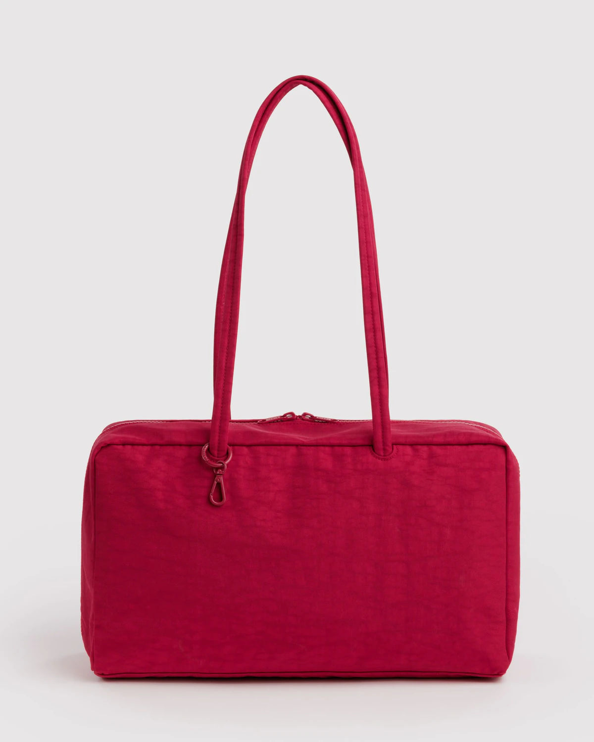 Red handbag on a light gray background