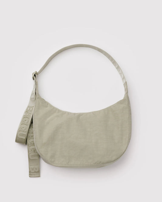 Beige shoulder bag on a light gray background