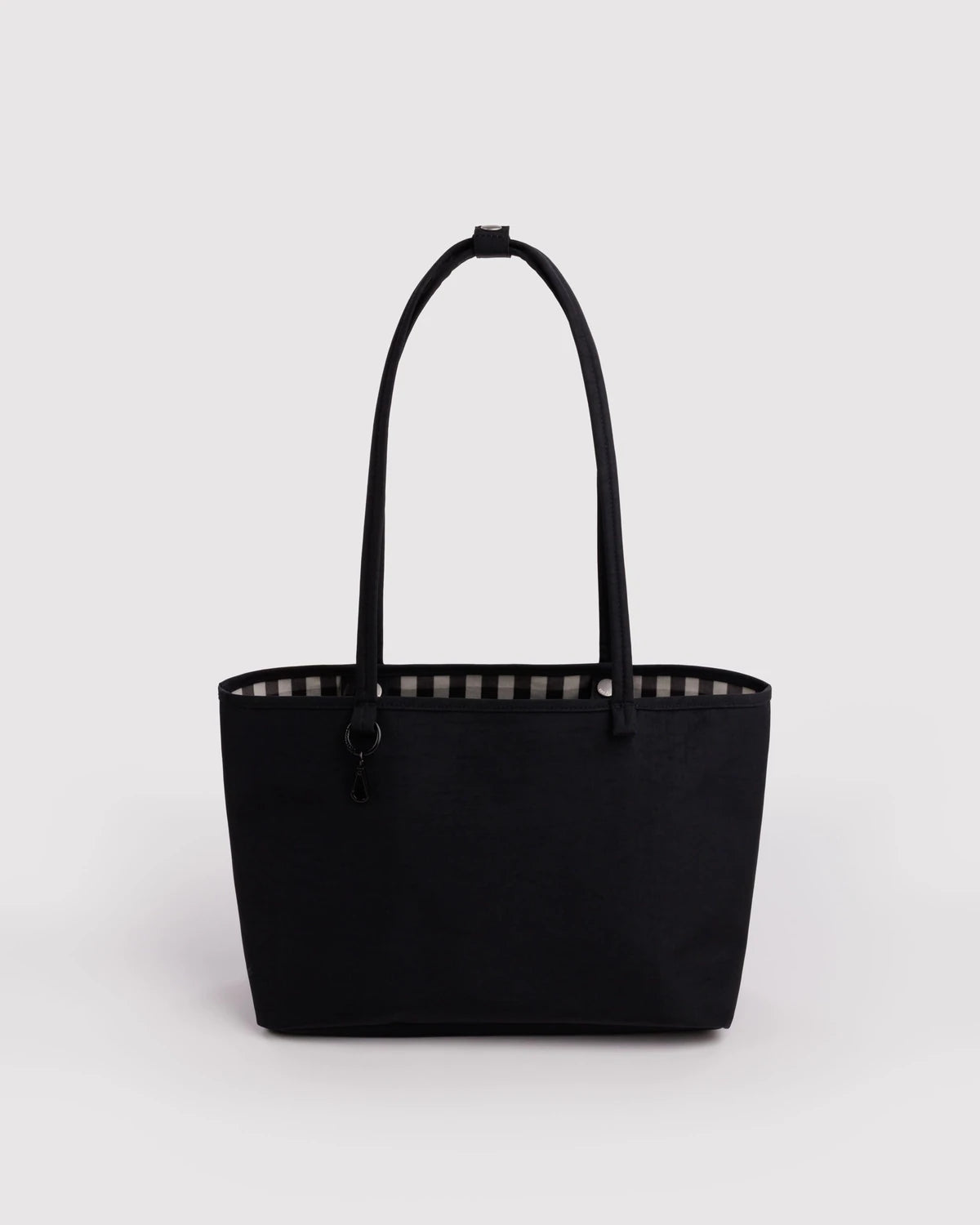 BAGGU Medium Nylon Reversible Tote in Black Mix and Gingham pattern on a grey background 