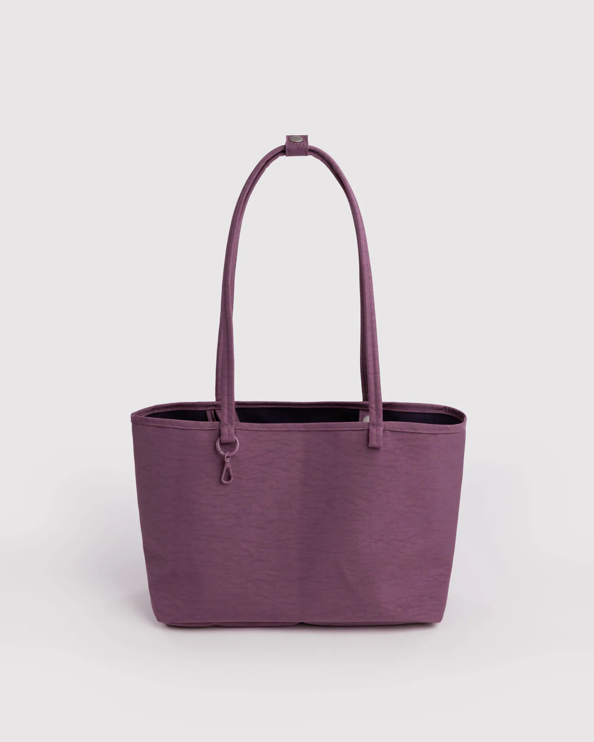 Purple tote bag on a light gray background