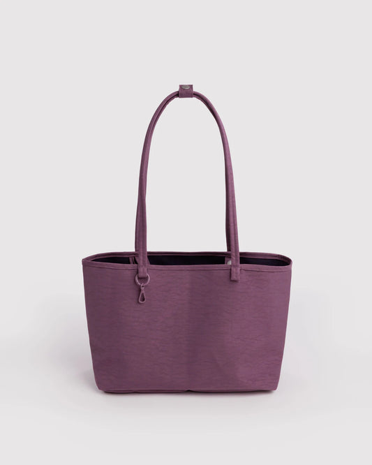 Purple tote bag on a light gray background