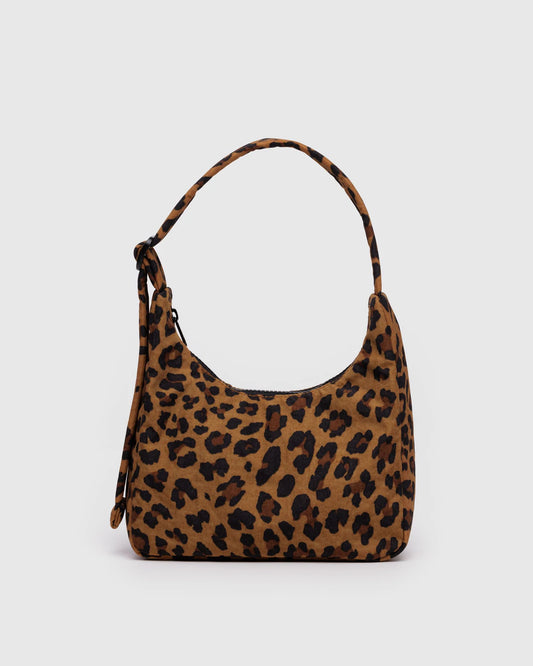 Leopard print handbag on a light gray background