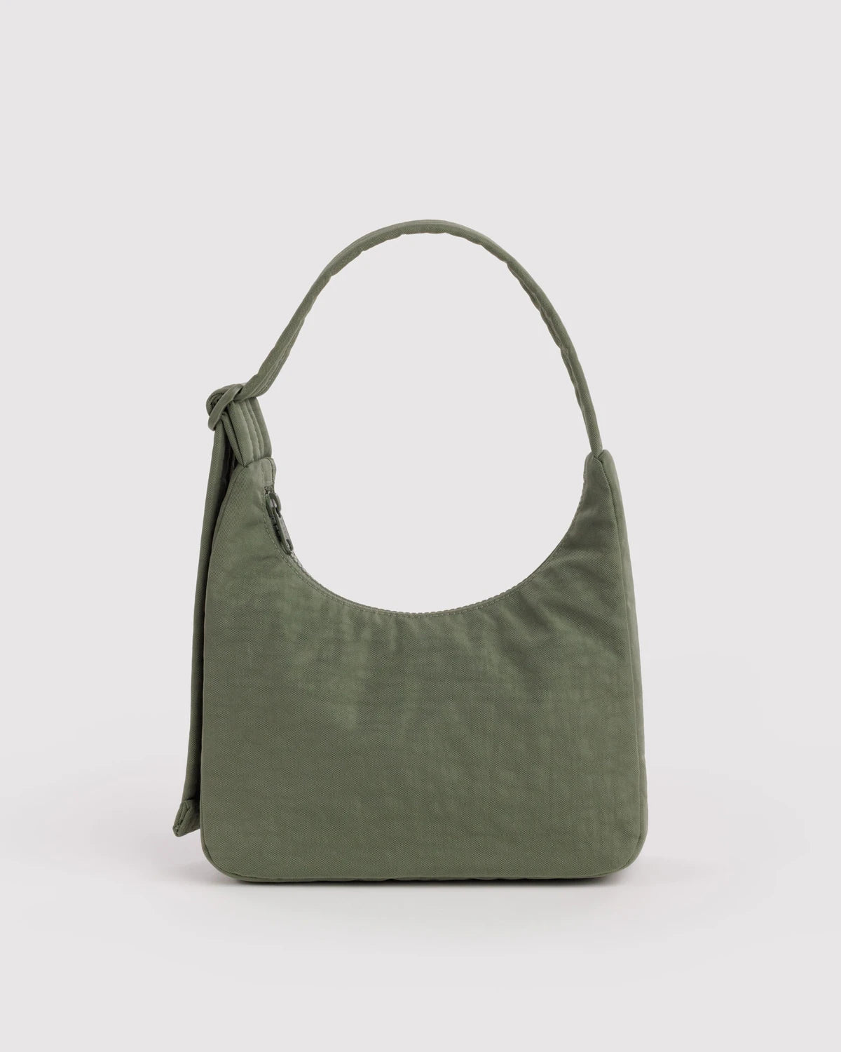 An olive green slouchy shoulder bag with a single strap, shown against a plain light gray background.
