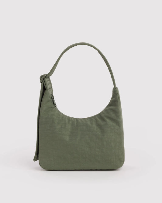 An olive green slouchy shoulder bag with a single strap, shown against a plain light gray background.