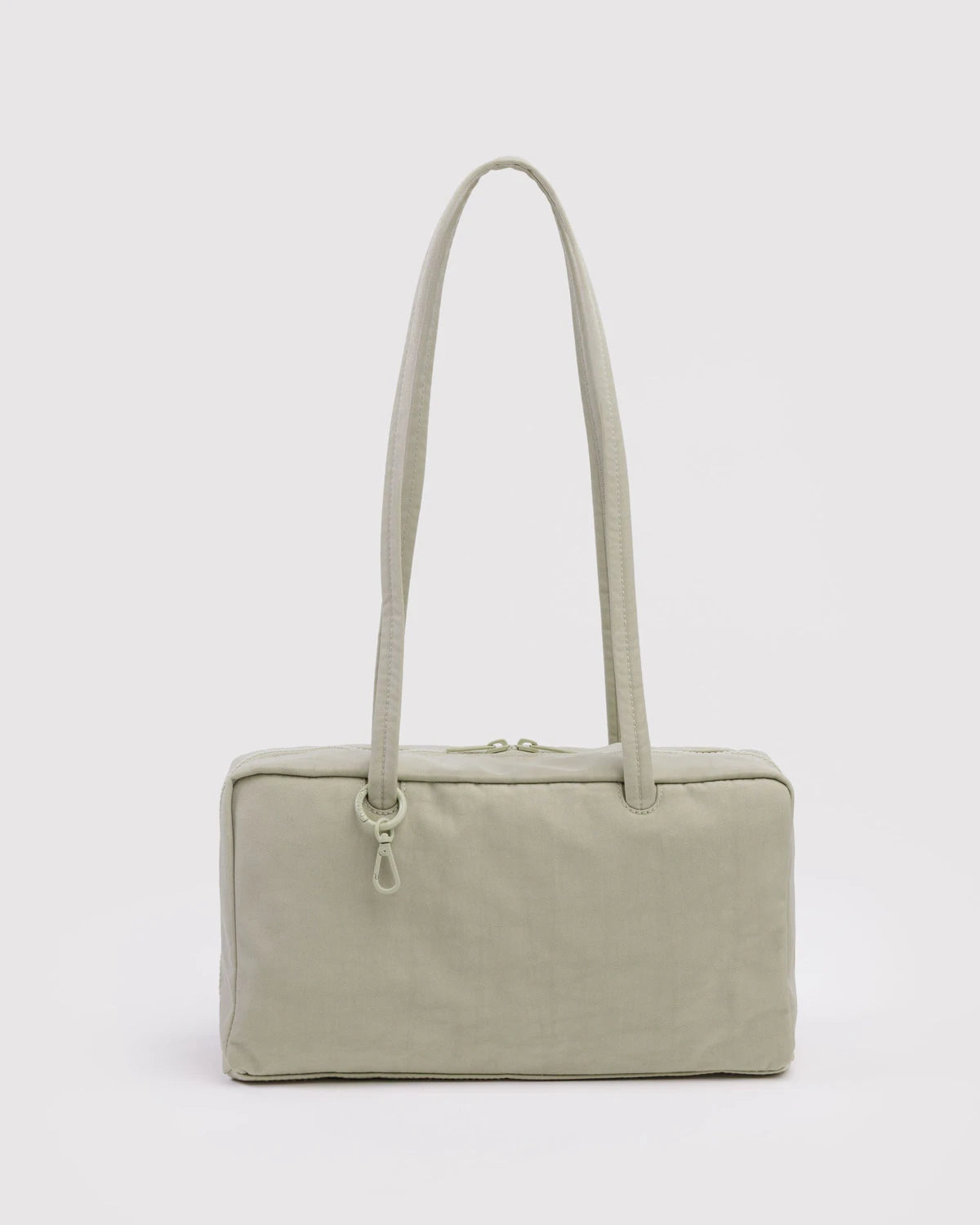 Beige handbag with a strap on a white background