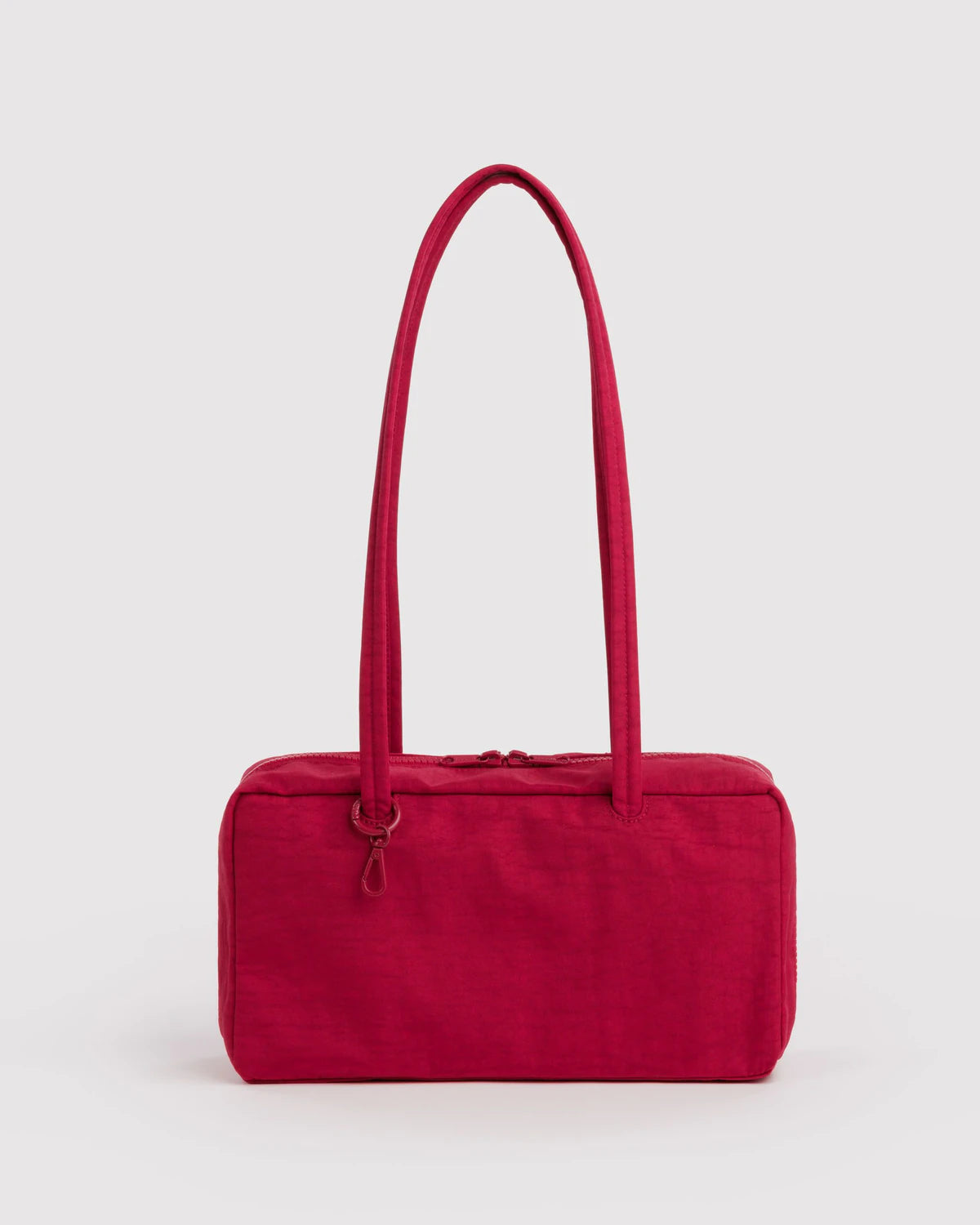 BAGGU Nylon Bowler Bag in Cherry red colour on a grey background 
