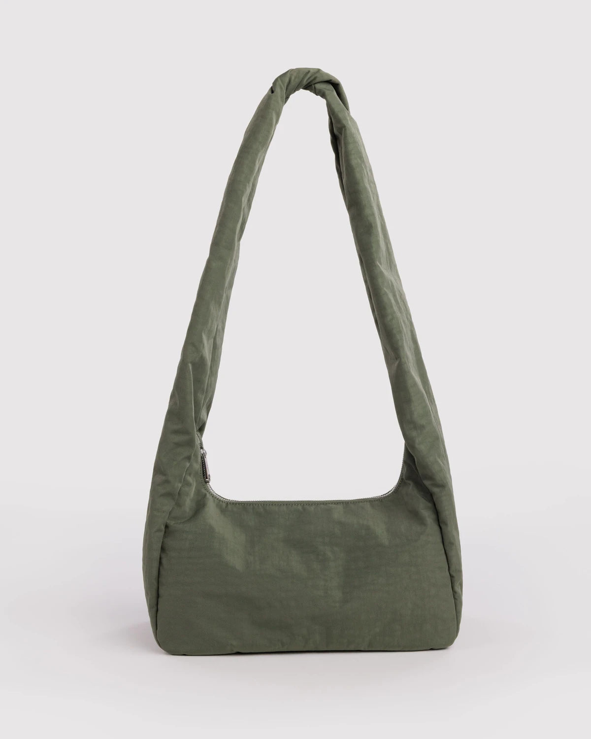 Green shoulder bag on a light gray background