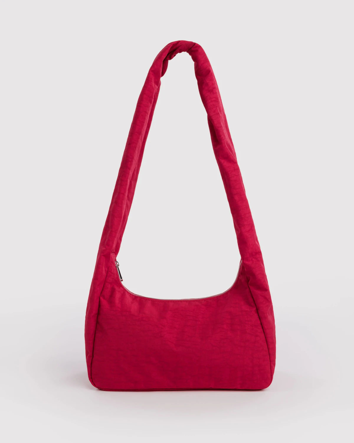 Red shoulder bag on a light gray background