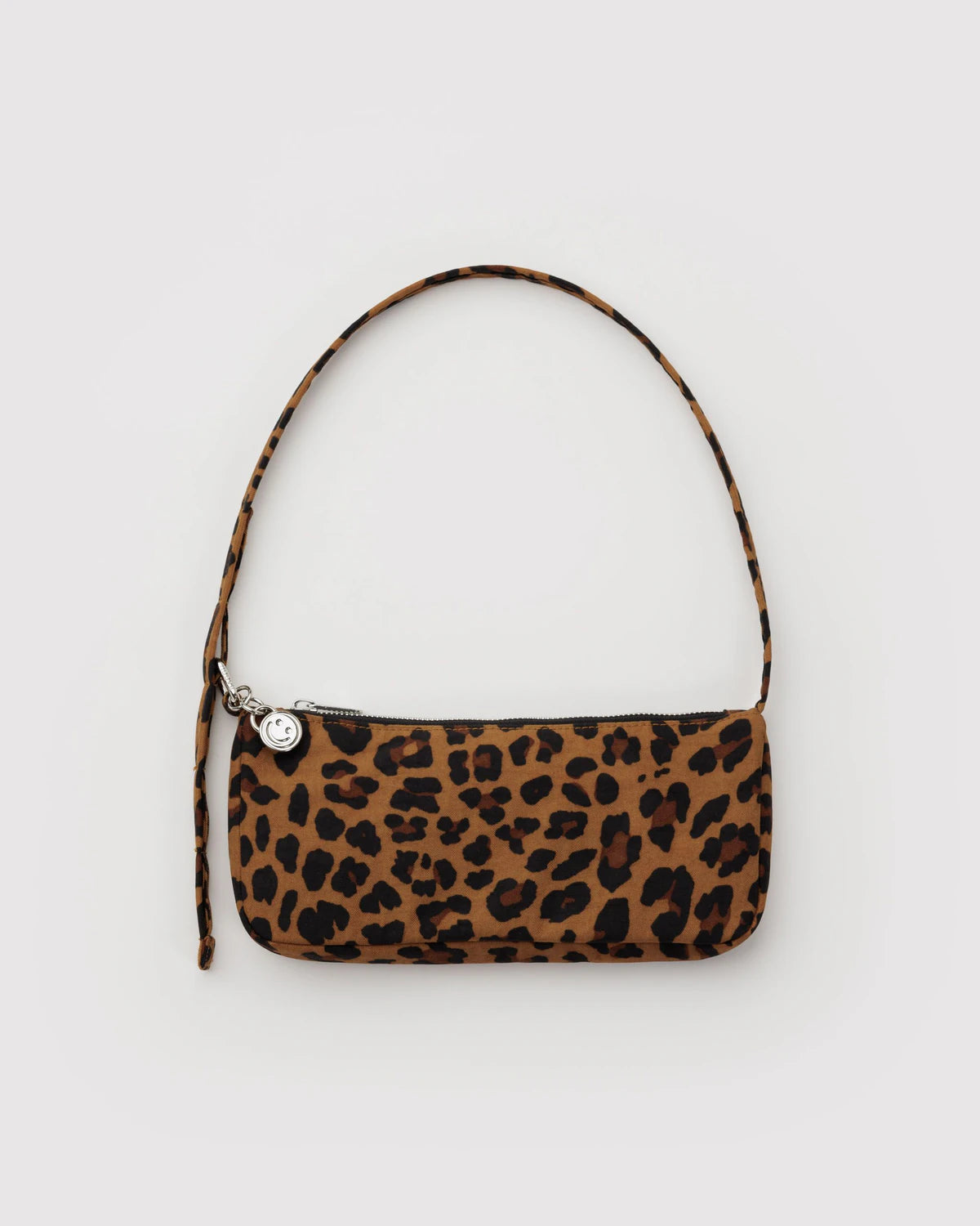 Leopard print handbag on a light gray background