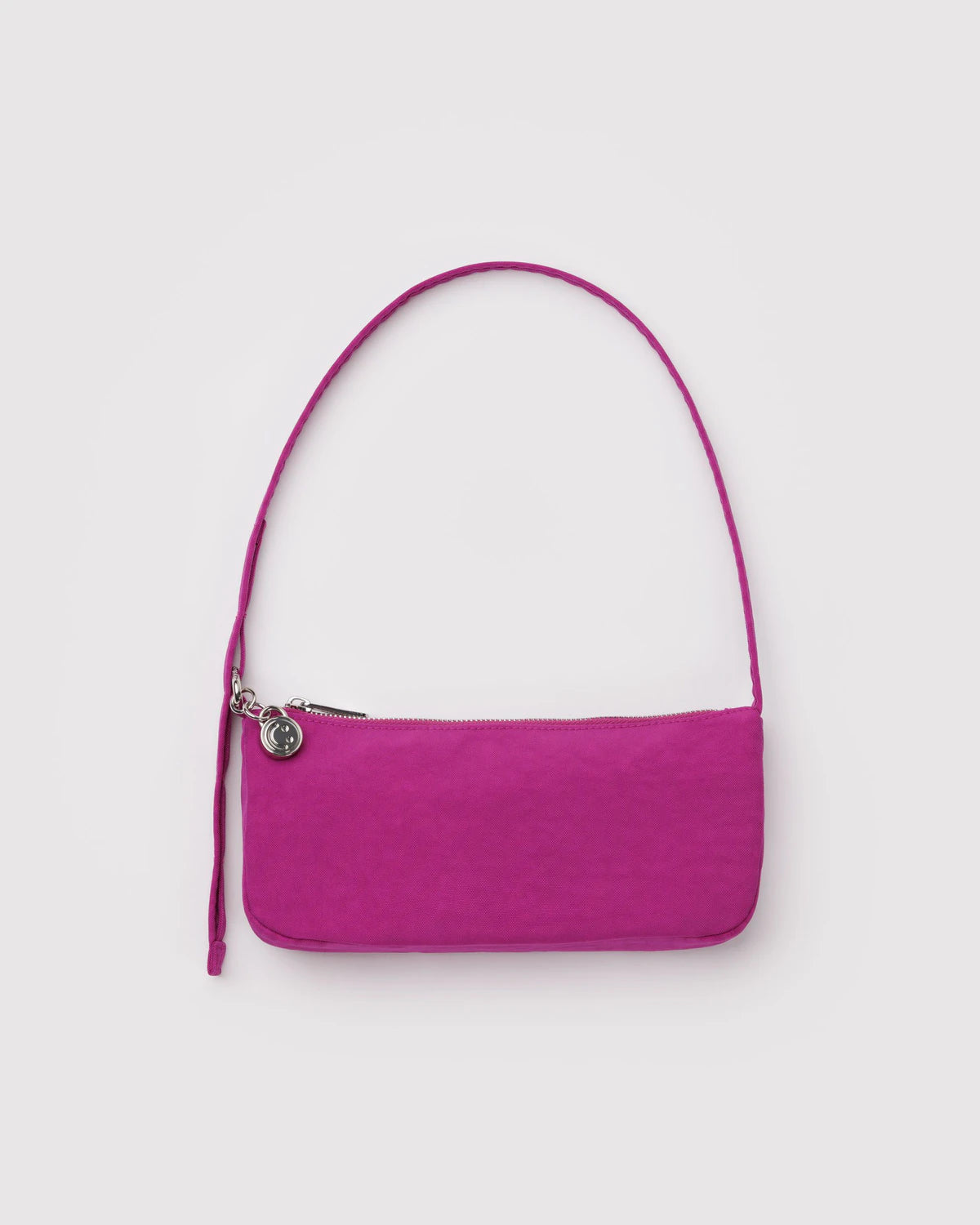 Purple handbag with a strap on a light gray background
